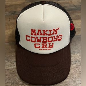 Makin’ cowboys cry trucker hat